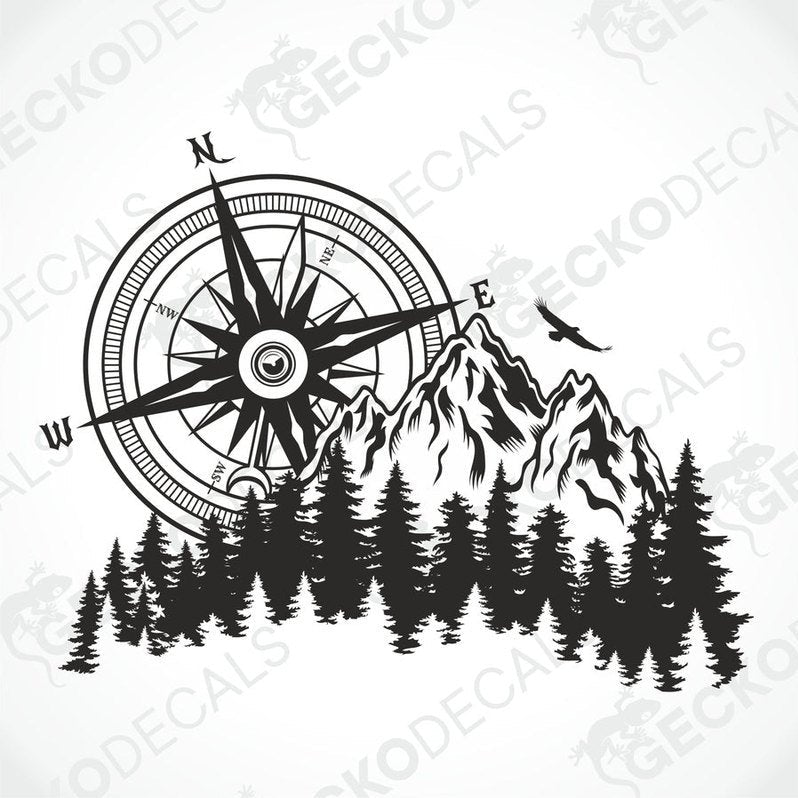 A white car decal with a compass design, mountains, and pine trees.