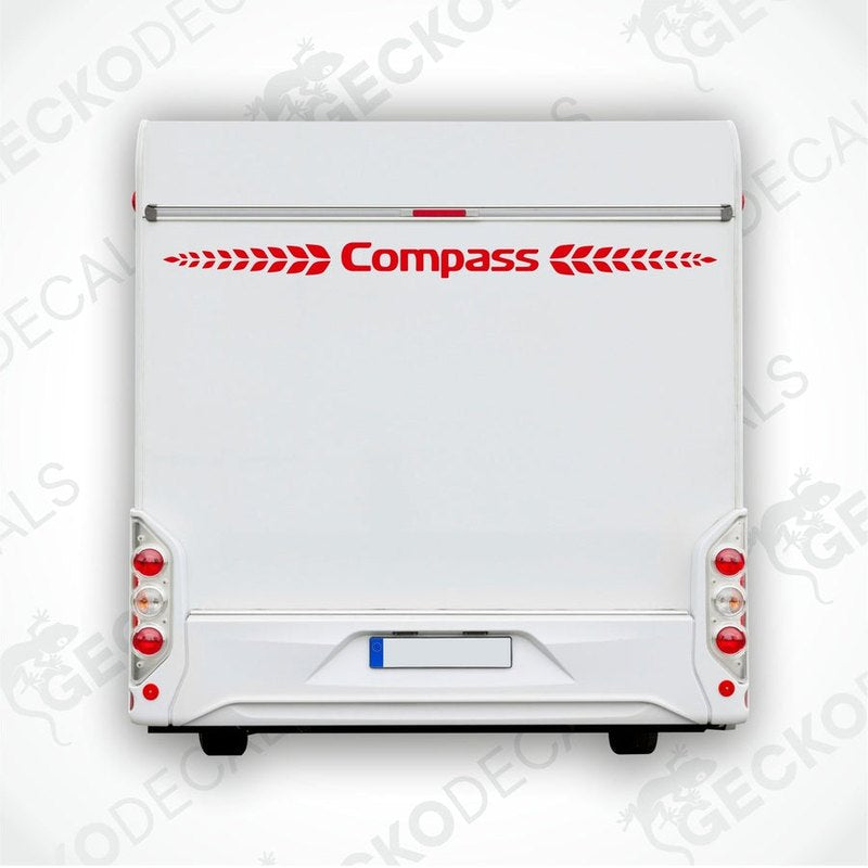 A white Compass caravan with a die cut sticker of the Compass logo on the rear side.