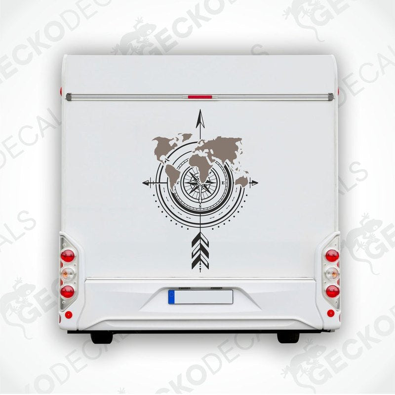 World map compass die cut decal applied to white RV rear door