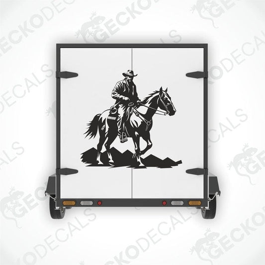 A die cut decal featuring a black and white cowboy riding a horse on the back of a trailer.