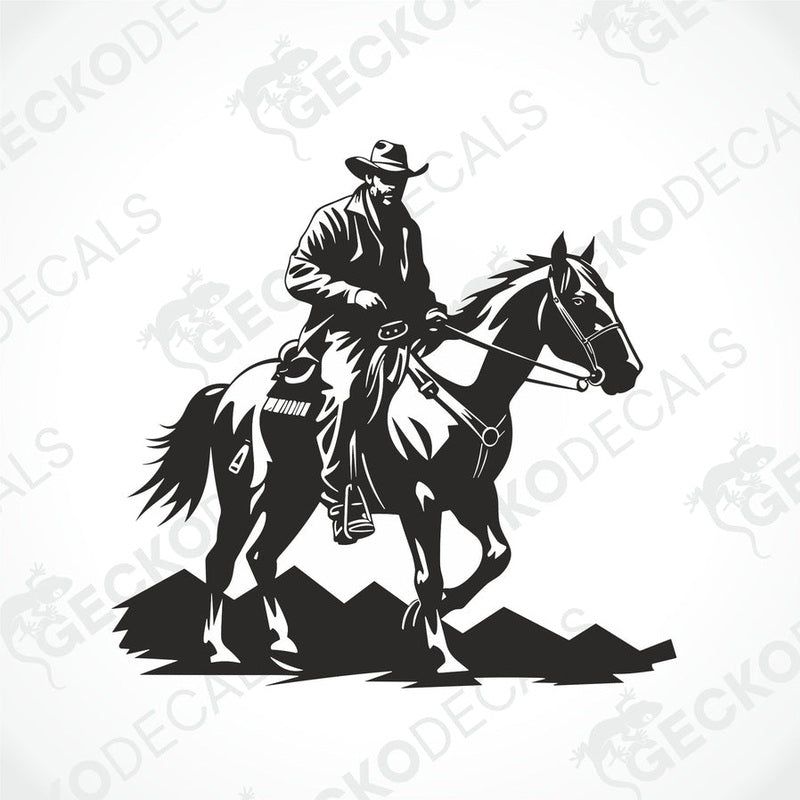 A black and white decal of a cowboy riding a horse. 
