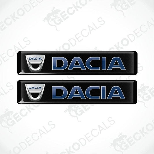 Two black vinyl stickers with the word 'DACIA' printed in blue, placed against a white background.
