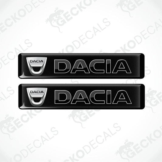 Two black vinyl stickers with the word 'DACIA' written in bold letters, placed against a white background.