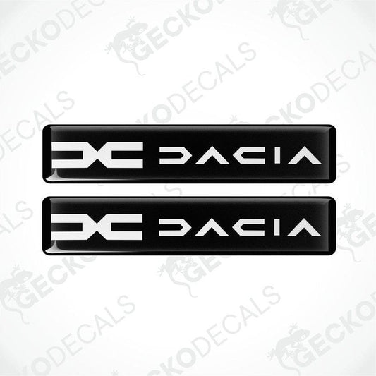 A pair of black vinyl decals with the word 'DACIA' written in white.
