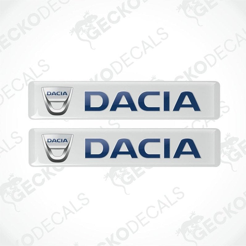 Two white vinyl stickers with the word 'DACIA' printed in blue, placed against a white background.