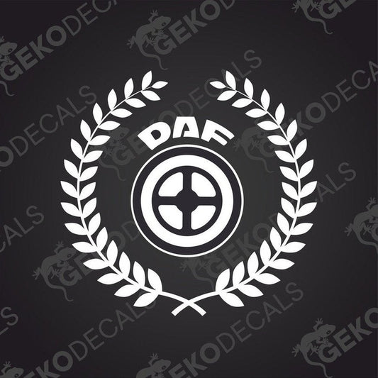 A die cut decal with a laurel wreath surrounding the letters 'DAF' in the center, presented on a black background.