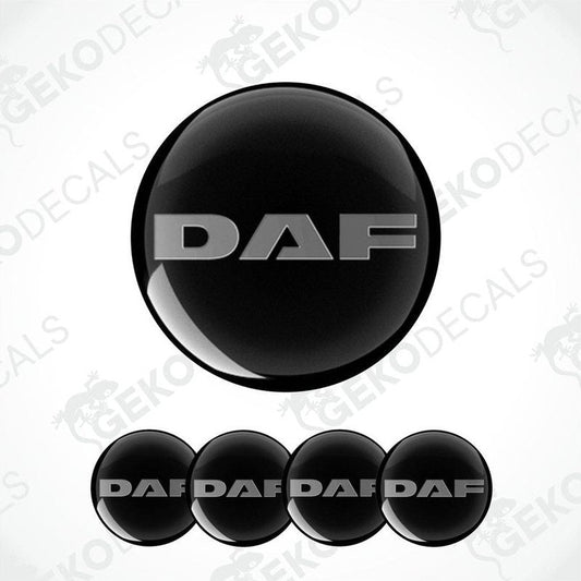 A set of four black vinyl stickers with the word 'DAF' printed on them, arranged in a circular pattern.