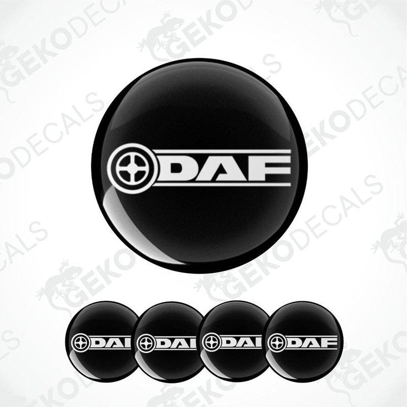 A set of four black vinyl stickers with the DAF logo, designed for use as wheel covers.