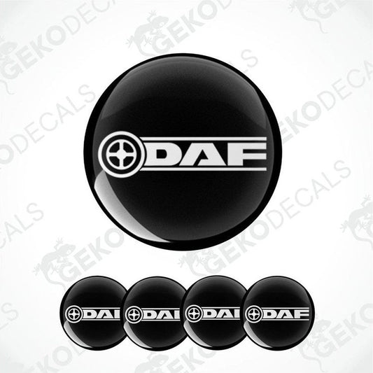 A set of four black vinyl stickers with the DAF logo, designed for use as wheel covers.