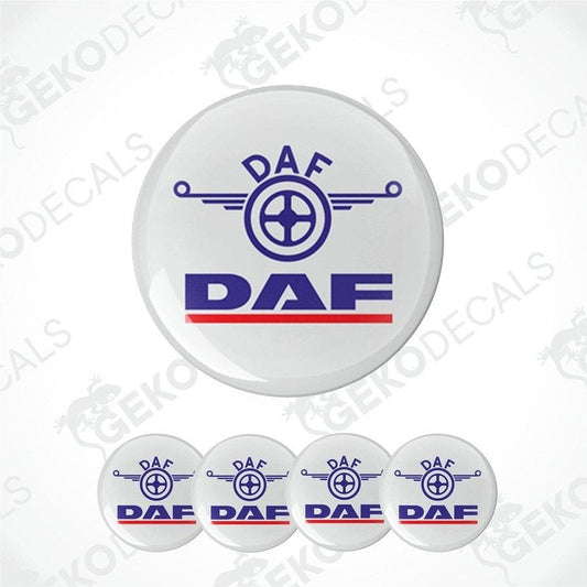 Set of four white decals, each with the DAF logo. The decals are dome-shaped and are designed for use on vehicle wheel arches.