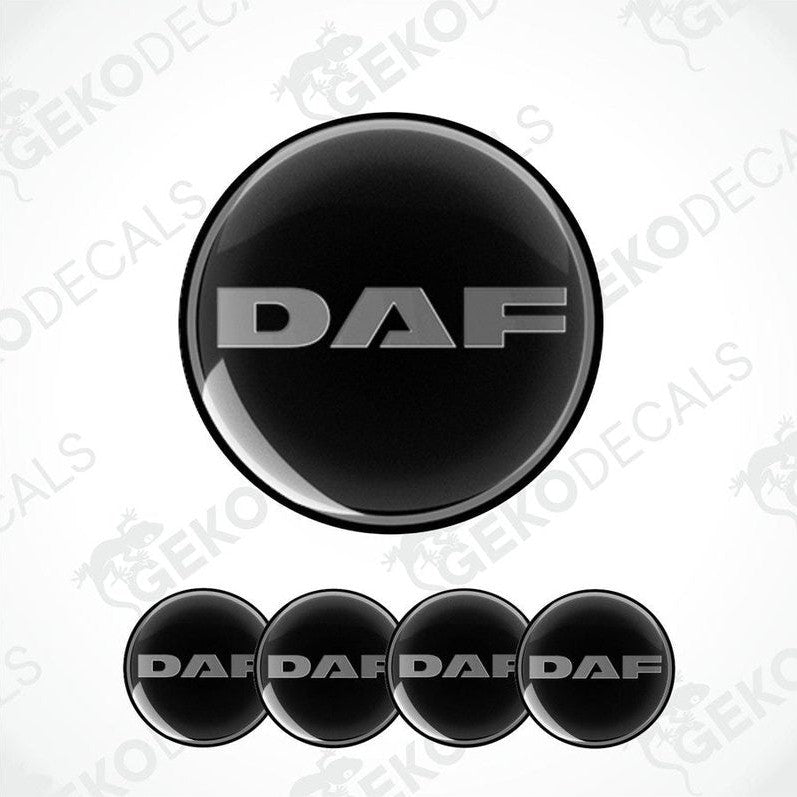 A set of black vinyl decals with the 'DAF' logo displayed prominently in the center decal, with four additional decal domes shown below.