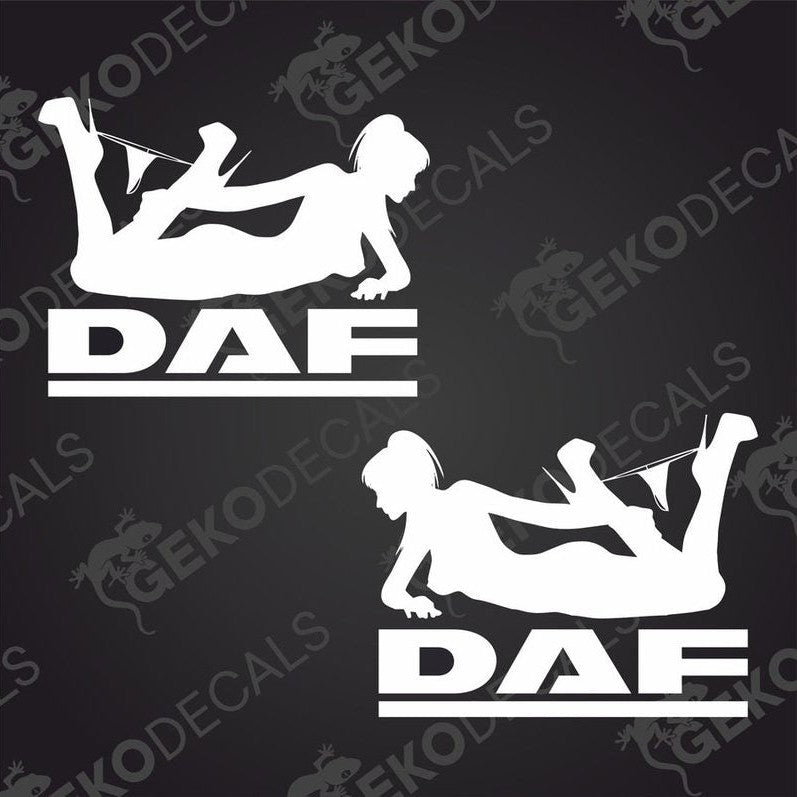 A pair of white die cut decals featuring the silhouette of a girl with the letters 'DAF' beside each figure. Intended for use on vehicles as decorative stickers.