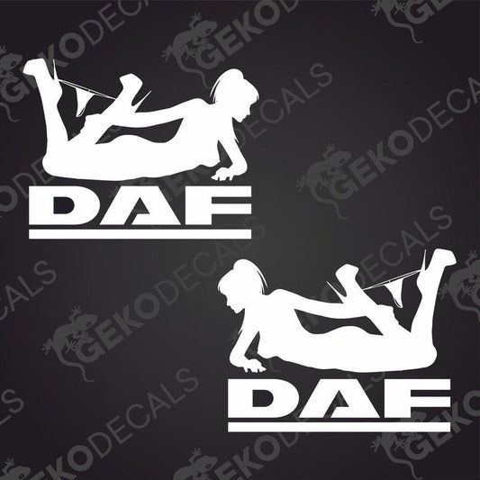 A pair of white die cut decals featuring the silhouette of a girl with the letters 'DAF' beside each figure. Intended for use on vehicles as decorative stickers.