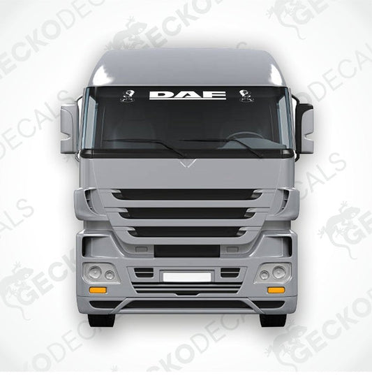 A die cut decal with the text 'DAF GIRLS' positioned on the windscreen of a gray truck.