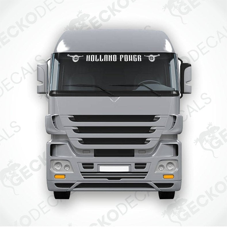 A sticker with the text 'Holland Power' displayed on the front windscreen of a gray truck.