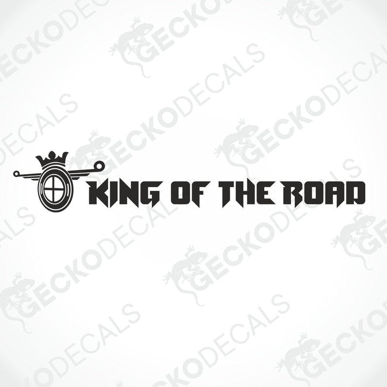 A die cut decal with the text 'KING OF THE ROAD' positioned on the windscreen of a gray truck.