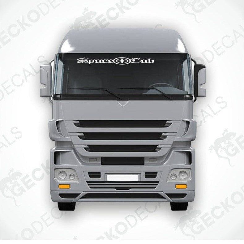 A front view of a DAF truck space cab with a die-cut decal on the windscreen.
