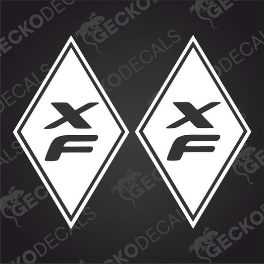 Two white diamond-shaped car decals with the letters 'XF' in the center, one with the decal face up and the other with the decal face down, both on a black background with a 'GeckoDecals' text overlay.