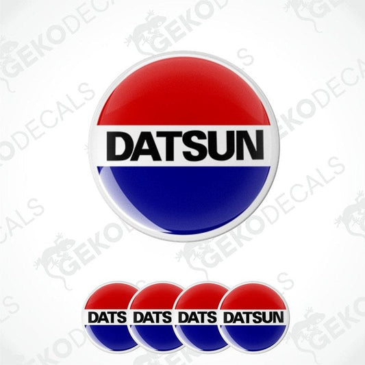 A set of four vinyl decals with polyurethane coating featuring the Datsun logo in black, red,blue and white colors.