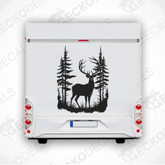 A decal of a black deer with antlers, placed on the side of a white vehicle, set against a background of a forest.