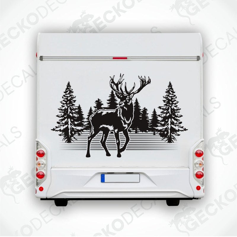 A die cut decal of a deer with a forest background, intended for use on vehicles or other surfaces.