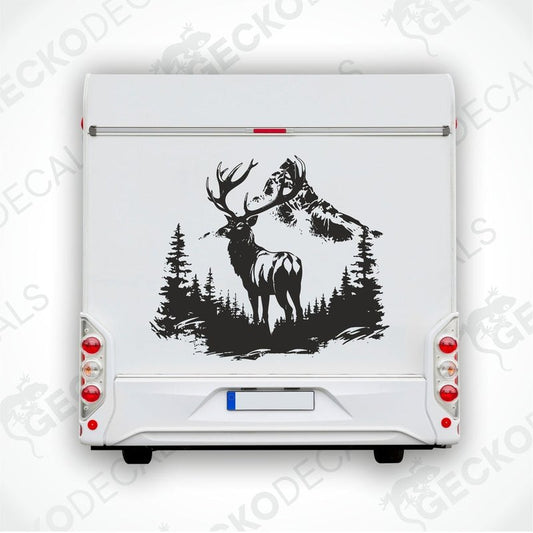 A decal of a deer with a full rack of antlers and a mountain range in the background, positioned on the side of a white vehicle.