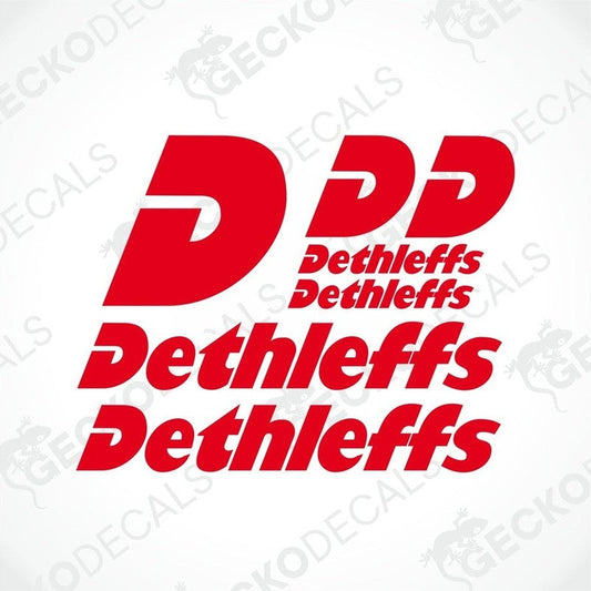 A set of red vehicle decals featuring the DETHLEFFS logo in white text.