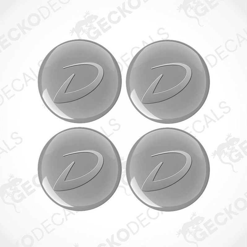 A set of four gray vinyl decals with the Dethleffs logo applied on a white background.