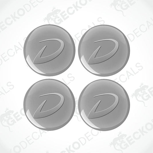 A set of four gray vinyl decals with the Dethleffs logo applied on a white background.