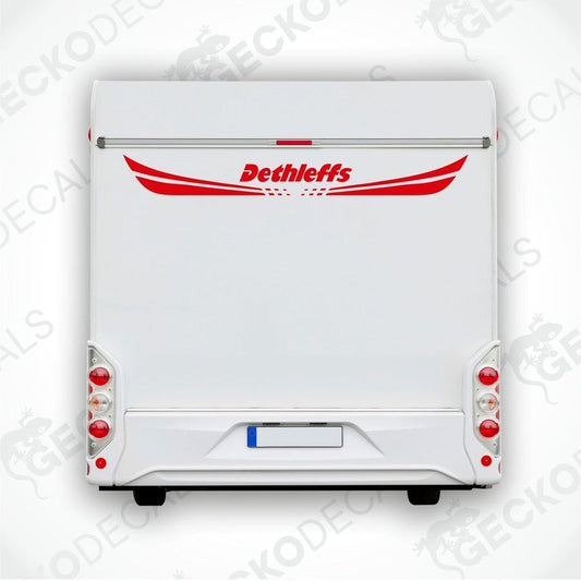 A white caravan with a red 'Dethleffs' decal on the rear side.