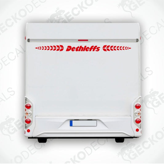 A white Dethleffs brand decal for a caravan, featuring the Dethleffs logo in red and white.
