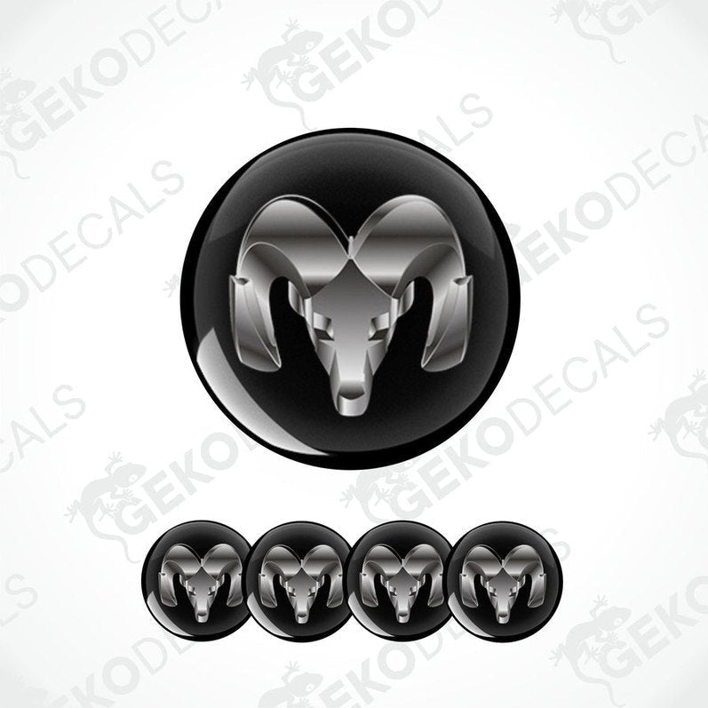 A set of four black vinyl stickers with a geometric design, including a stylized ram's head.