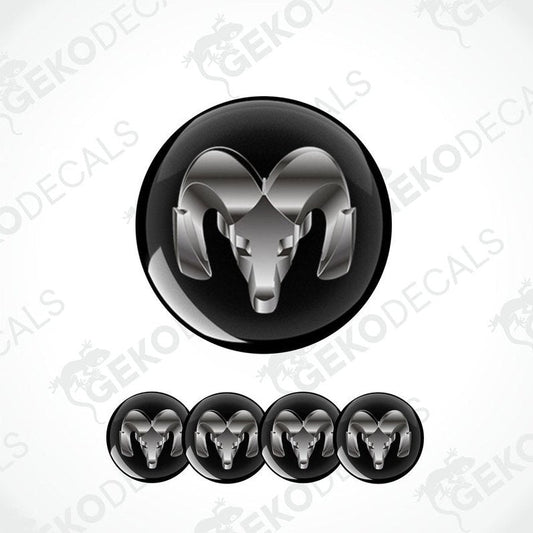 A set of four black vinyl stickers with a geometric design, including a stylized ram's head.