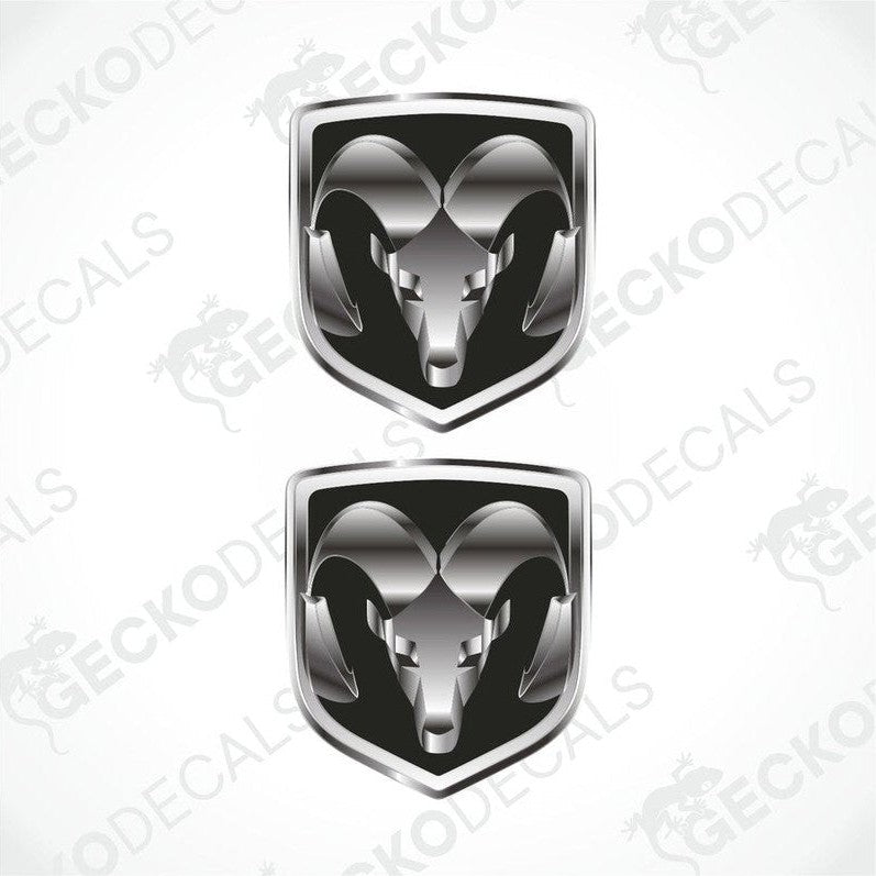 Two vinyl decals with a polyurethane coating featuring a ram's head on a shield-shaped background, intended for use as car decals.