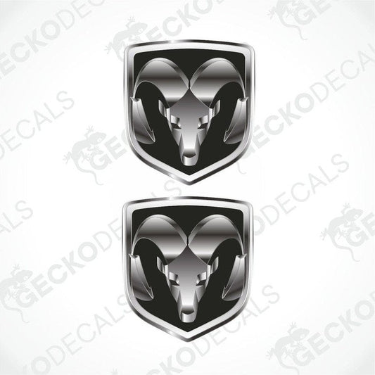 Two vinyl decals with a polyurethane coating featuring a ram's head on a shield-shaped background, intended for use as car decals.