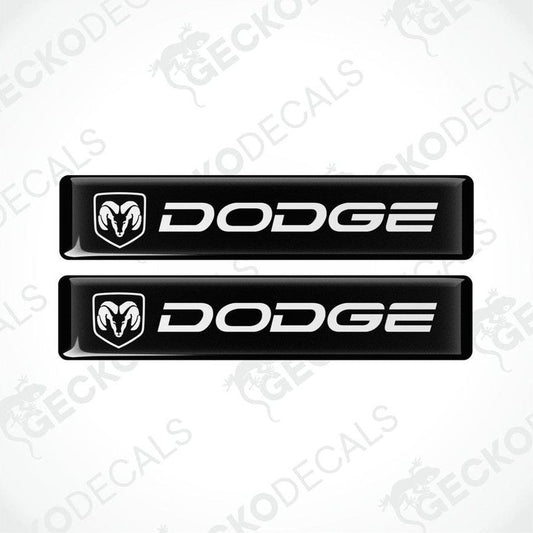 Two black vinyl decals with the Dodge logo in white.