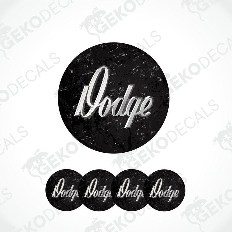 A set of four black vinyl stickers with the word 'DODGE' printed in white.