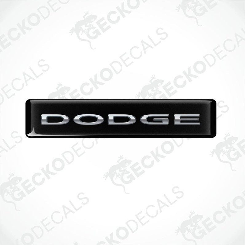 Black vinyl decals with the word 'DODGE' written in silver letters.