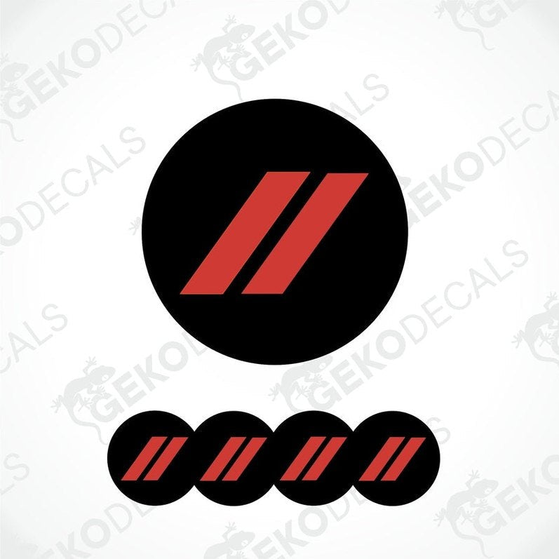 Set of four black and red vinyl decals, designed for car wheels and caps, with a geometric pattern.