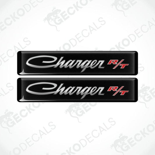 Two black vinyl decals with the text 'Charger R/T' on them, intended for use as car stickers.
