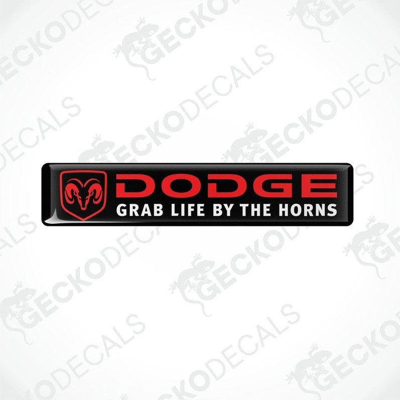 Black, red, and white vinyl decals with the text 'DODGE' and 'GRAB LIFE BY THE HORNS' on them.