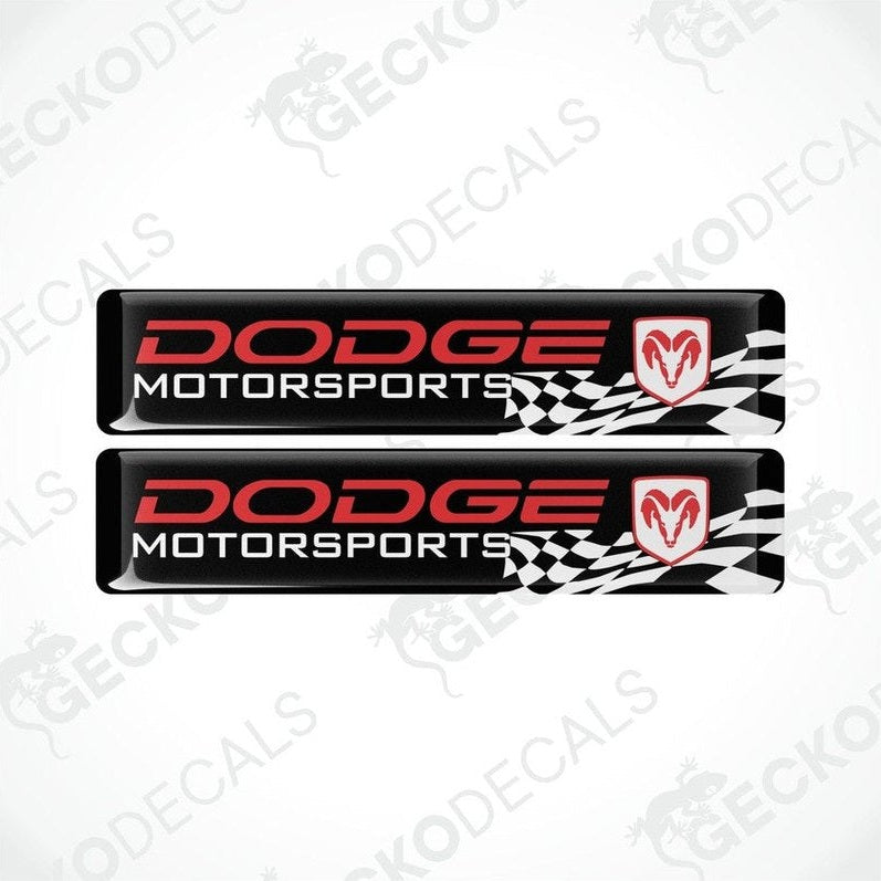 Two black, red, and white vinyl decals with the text 'DODGE Motorsports' and a checkered design.