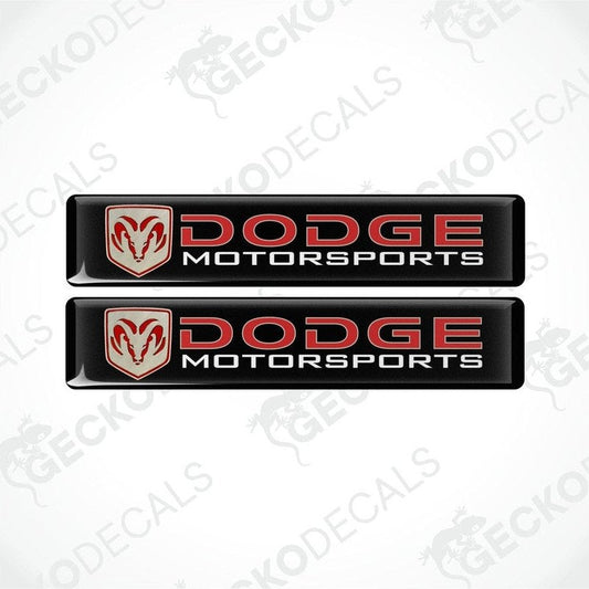 Two black vinyl stickers with a red and white Dodge Motorsports logo.