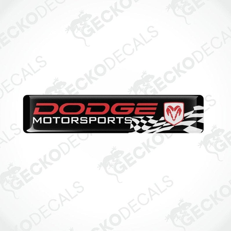 Black, red, and white vinyl decals with the text 'DODGE Motorsports' and a checkered design.