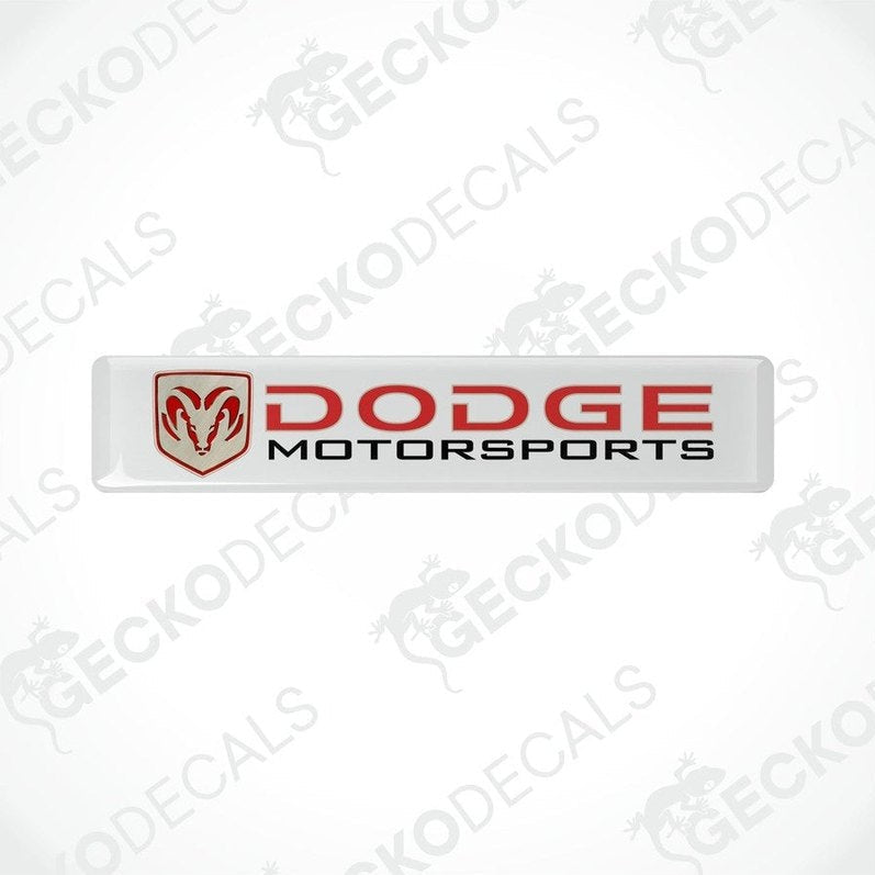 White vinyl stickers with a red and black Dodge Motorsports logo.