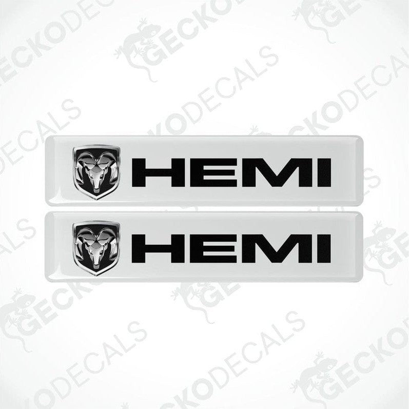 Two white vinyl stickers with the HEMI logo in black.