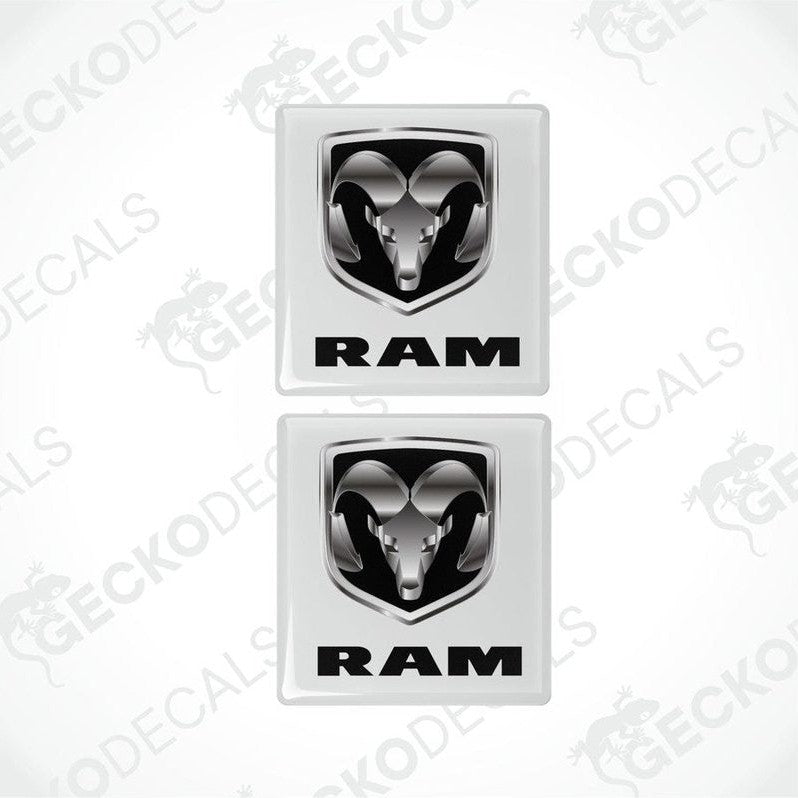 Two white vinyl stickers with a dodge ram logo, set against a white background with 'GECKODECALS' text.