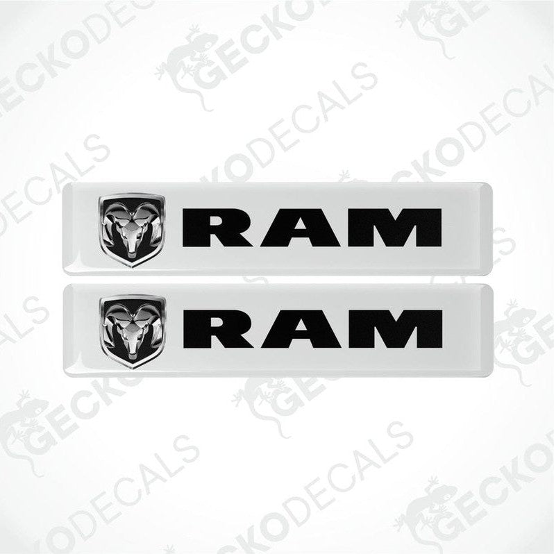 Two white vinyl stickers with a black RAM logo on a white background.