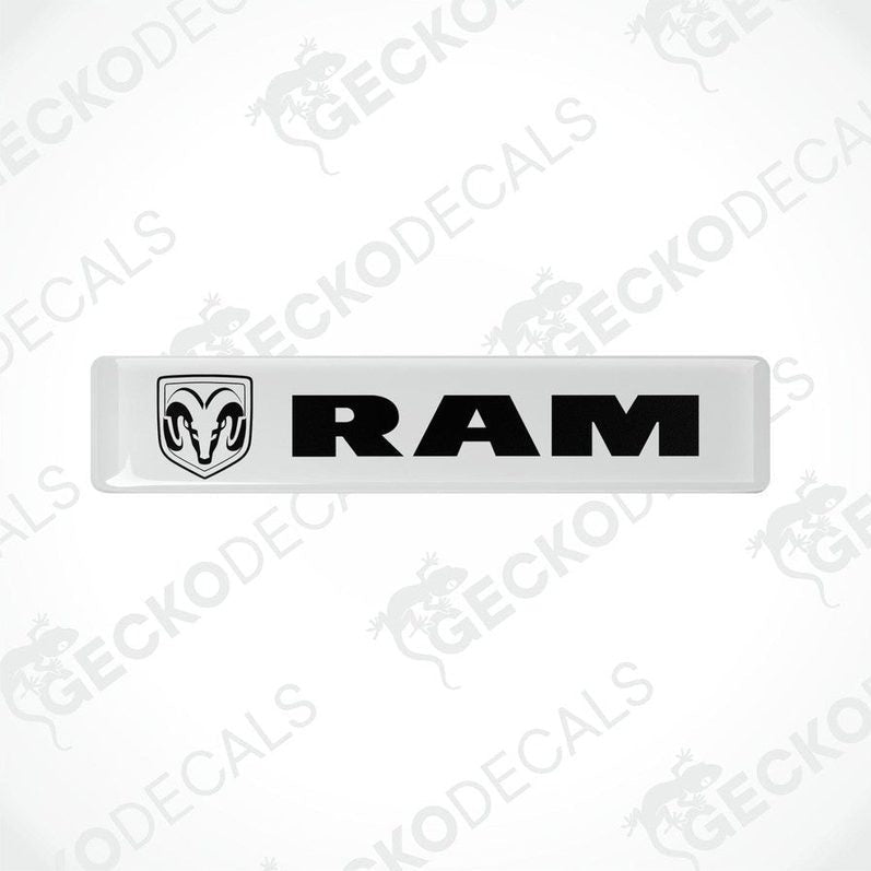  White vinyl decals with the RAM logo on them, intended for use as car stickers.