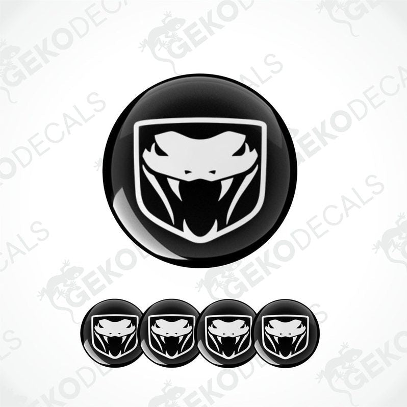 A set of four vinyl decals featuring a black and white viper logo.